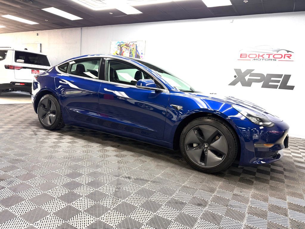 tesla model 3 2018 5YJ3E1EA7JF160711 image tesla model 3 2018 5YJ3E1EA7JF160711 image